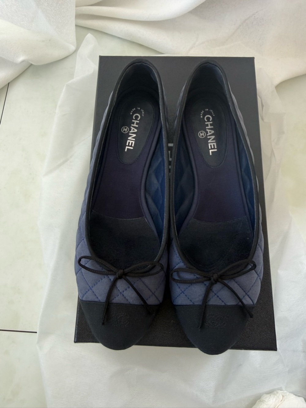 CHANEL Navy and Black Quilted Cap-Toe Ballet Flats